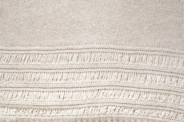 krem örme yün kumaş üzerinde yatay kalıp