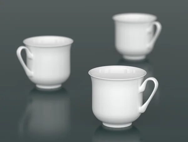 Three porcelain cups with DOF — Stock Photo, Image