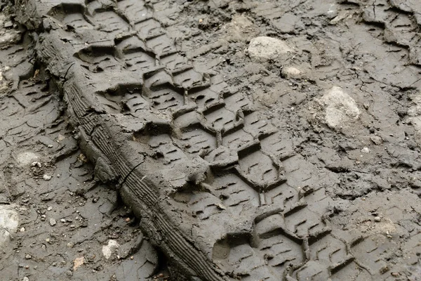 Traces of tires on a dirt road — Stock Photo, Image