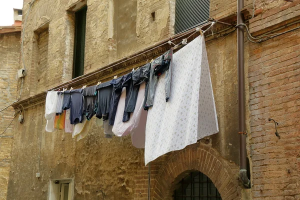 Linen drying on a wind — Stock Photo, Image