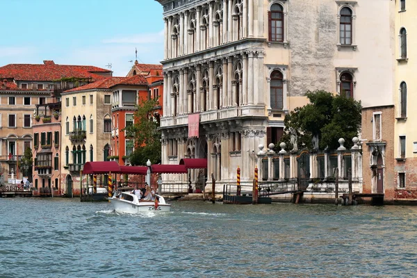 Venice, Italy. People make a tour on a white boat — Stock Photo, Image