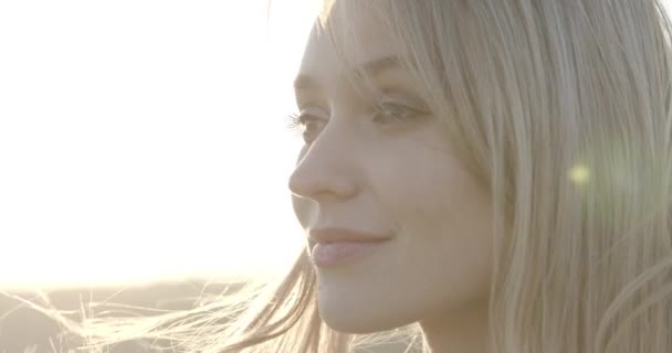 Close up frame of dreamy look of the young happy woman — Stock Video