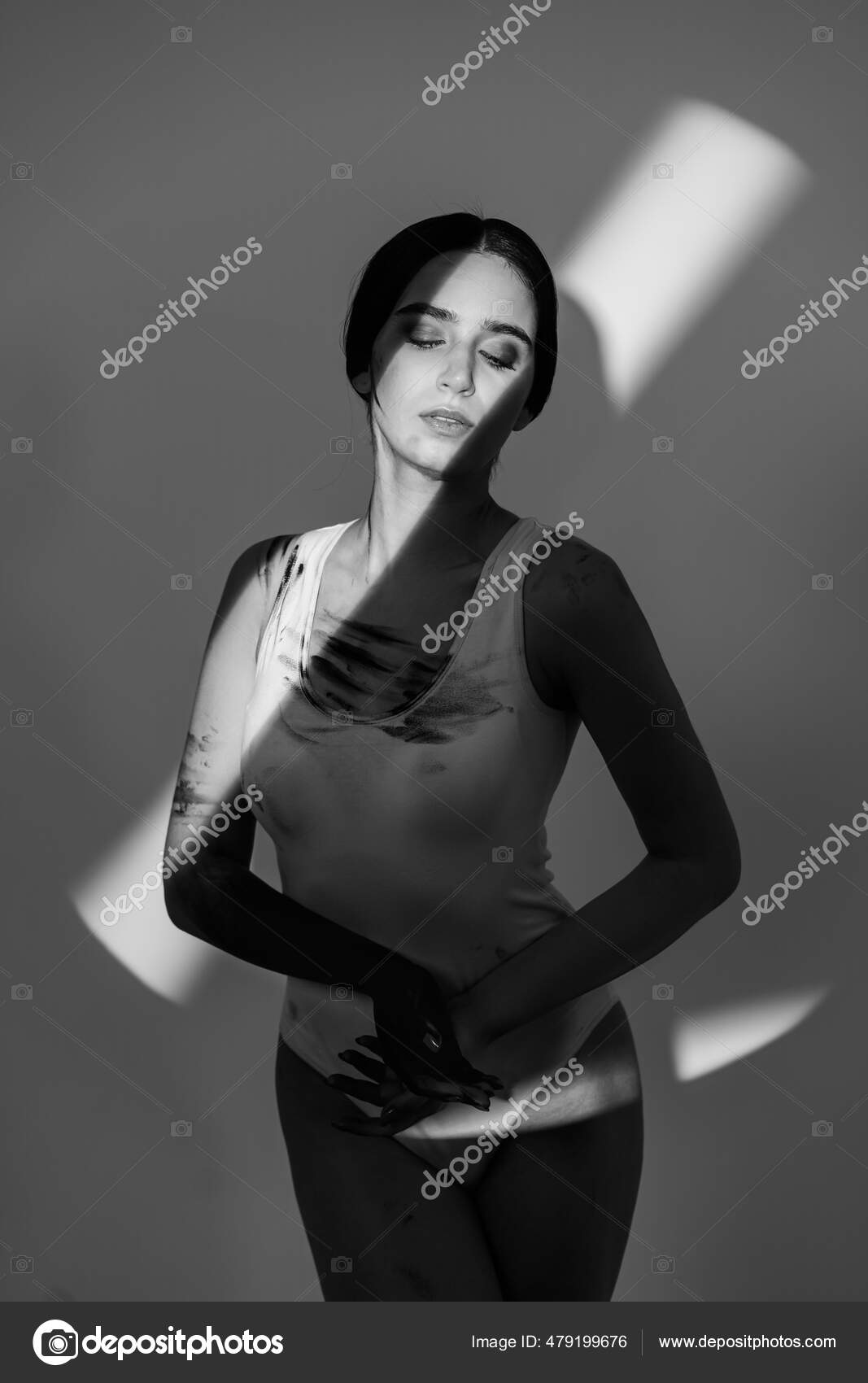 Woman In Black And White Body Paint Stock Photo - Download Image