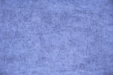 Açık mavi soyut arkaplan. Denim dokusu. Sert pamuk kumaş dokusu.
