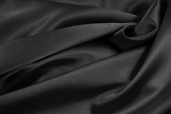 黒サテンの背景 光沢のある生地の質感の背景を粉砕 黒エレガントなシルクの背景 — ストック写真