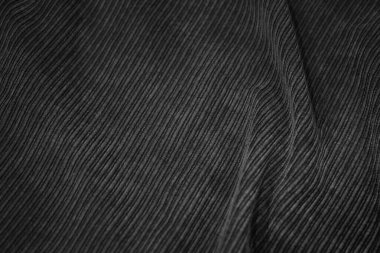 Kahverengi soyut kumaş arka plan. Koyu kahverengi kadife kumaş arka planı. Yumuşak katlanmış arka planı olan tırtıklı kumaş. Tasarımınız için fotokopi alanı ile birlikte zarif arkaplan.