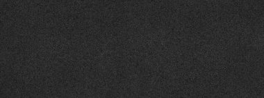 Siyah soyut arka plan. Beton duvar mermer parçalarıyla yapıldı. Tasarım için kopyalama alanı olan siyah taş arkaplan. Geniş web pankartı.