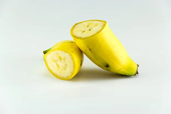 Cut Banana over white background — Stock Photo, Image