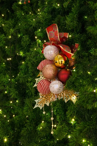 Gold Christmas background of defocused lights with christmas orn — Stock Photo, Image