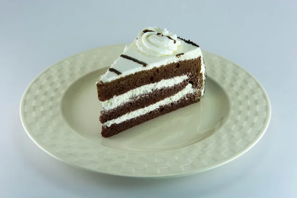 Té caliente con pasteles sobre fondo blanco . — Foto de Stock