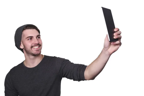 Selfie tablet ile alarak genç adam. — Stok fotoğraf