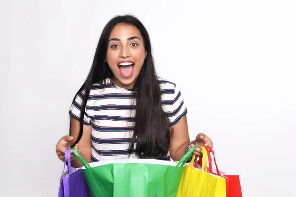 Mujer sosteniendo bolsas de compras —  Fotos de Stock