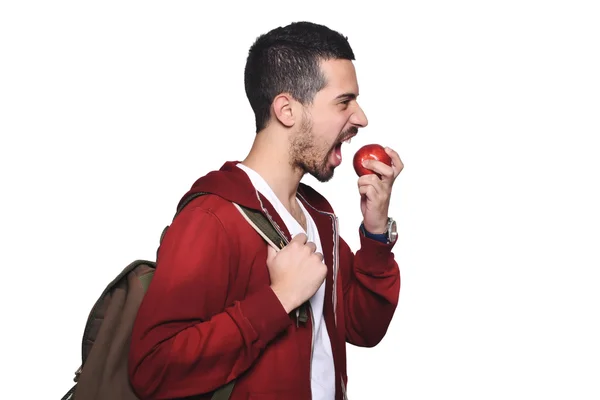 Portré fiatal latin diák egy alma és hátizsák . — Stock Fotó