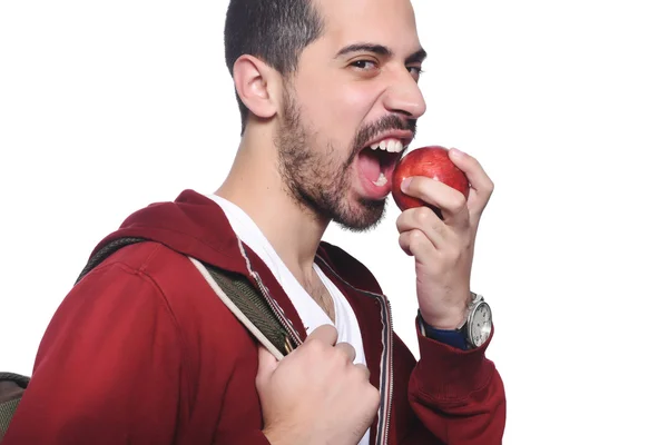 Portrait de jeune étudiante latine avec une pomme et un sac à dos  . — Photo