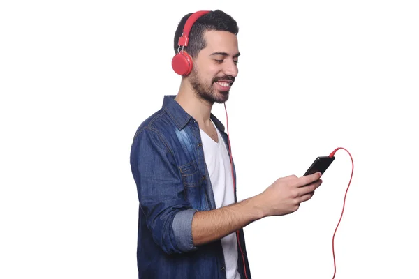 Fiatal férfi hallgató-hoz zene, smartphone. — Stock Fotó