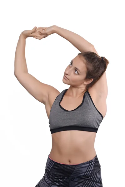 Atleta mujer joven haciendo ejercicio . —  Fotos de Stock