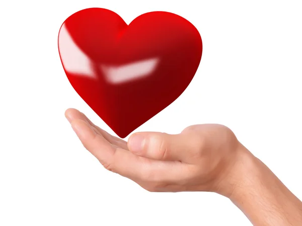 Piros szív a kezében. szeretet fogalma — Stock Fotó