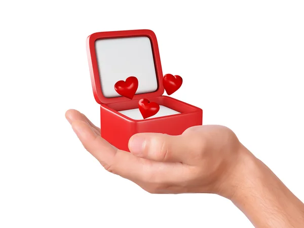 Mão mantenha corações em uma caixa de presente no fundo branco — Fotografia de Stock