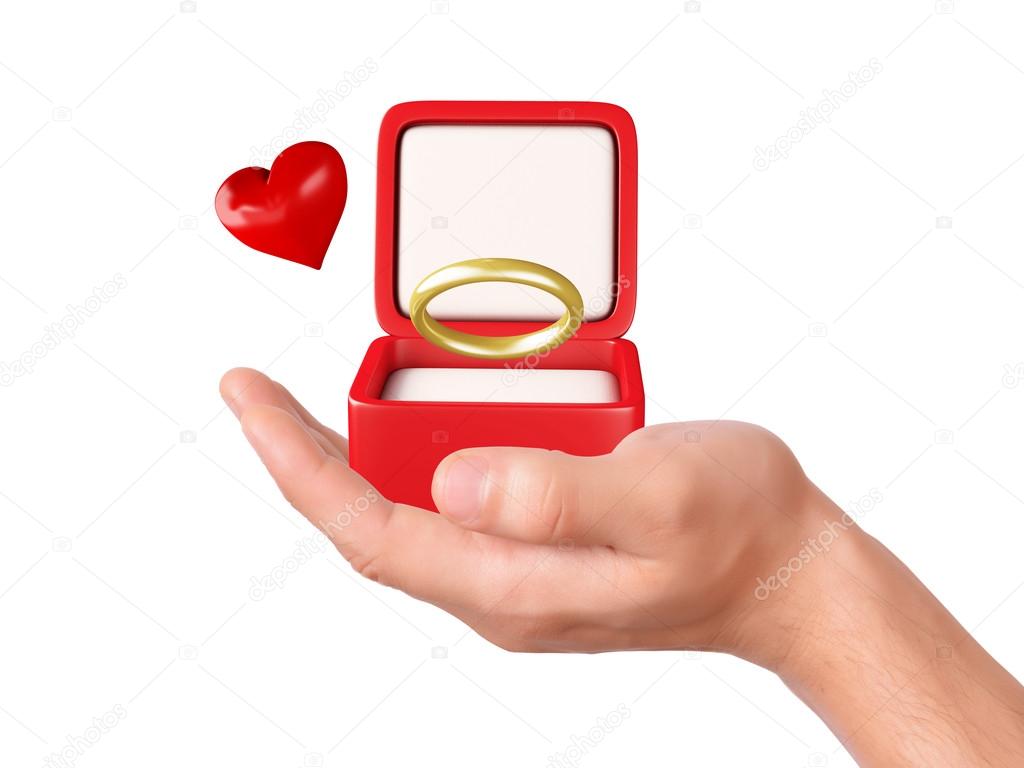 hand hold a gift box with wedding ring
