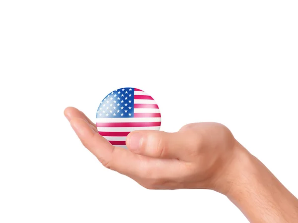 Sostener la mano icono de la bandera de Estados Unidos en el terreno de la panadería blanco — Foto de Stock