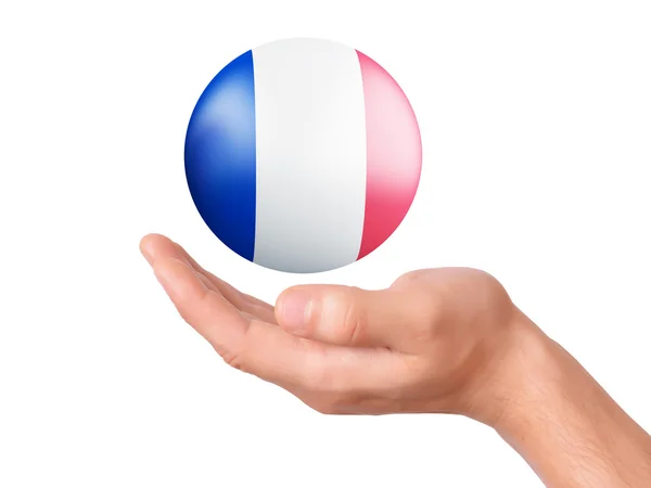 Hand halten Frankreich Flagge Symbol auf weißem Backboden — Stockfoto