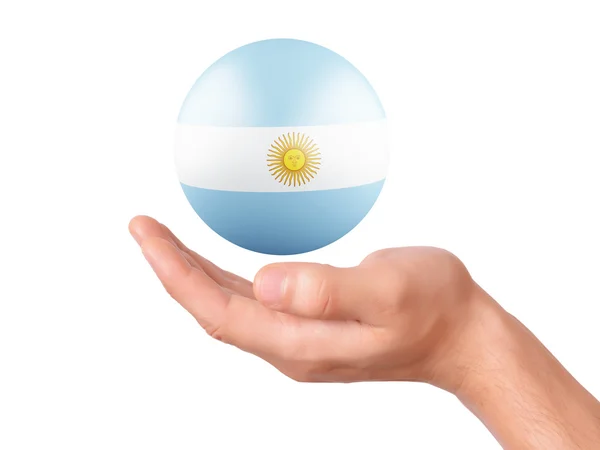 手が白い bakground でアルゼンチンの旗のアイコンを保持します。 — ストック写真
