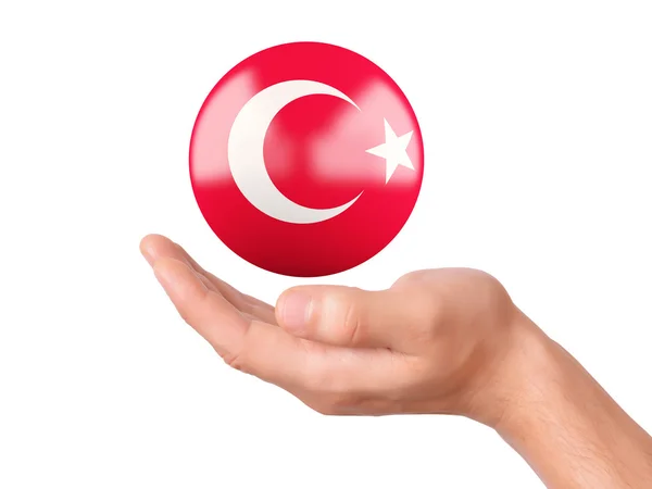 Elini tut Türkiye bayrak simgesi üzerinde beyaz bankamatik — Stok fotoğraf
