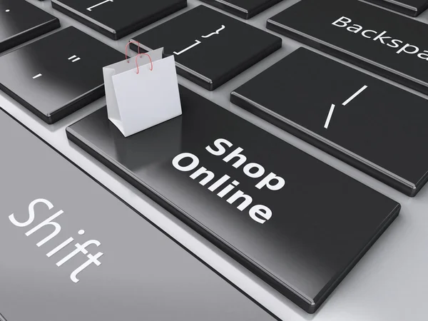 3D-Einkaufstasche auf Computertastatur. Online-Shopping-Konzept. — Stockfoto