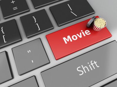 3d Popcorn and film reel on computer keyboard.