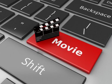 3d Cinema clapper board on computer keyboard.