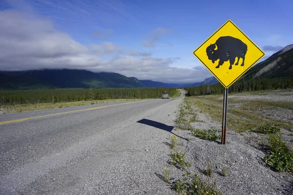 Yellow diamond warning road sign  watch for wildlife