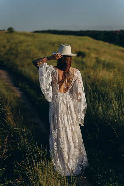 Beautiful Woman White Guipure Dress Hat Posing Field Standing Her — Stok fotoğraf