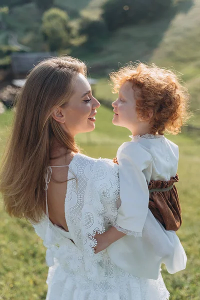 Beautiful Woman White Lace Dress Holding Her Little Redhead Daughter — Stock Photo, Image