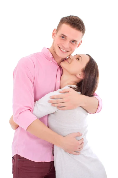 Un jeune couple debout ensemble et étreignant . — Photo