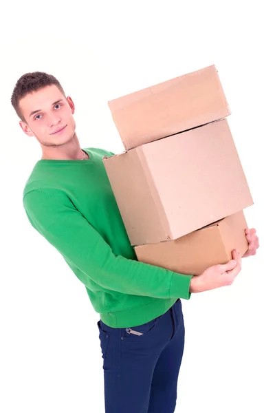 Hombre guapo llevando cajas — Foto de Stock