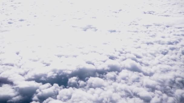 Aerial view from an airplane on a cloudy day. — Stock Video