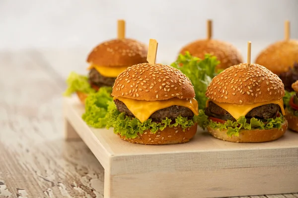 Mini Burgers Cheese Lettuce Sticks Wooden Background — Stock Photo, Image