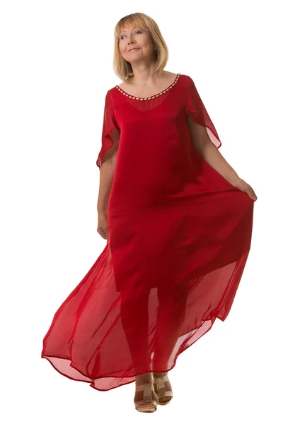 Attraktiv kvinna vinka utsökta röd klänning. — Stockfoto