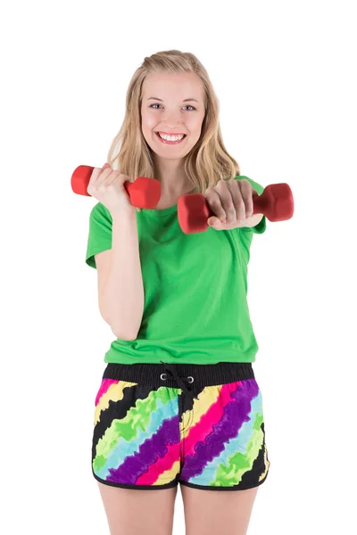 Blond woman exercising with red dumbbells. — Stock Photo, Image