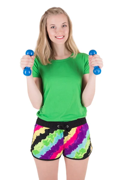 Vrouw doen oefening met blauwe halters in sportkleding. — Stockfoto