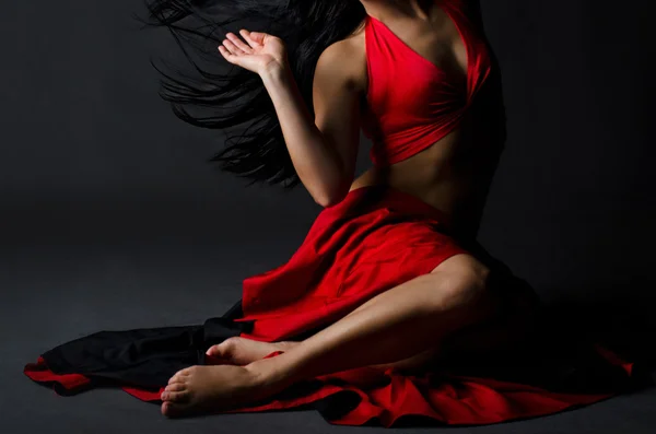 Pretty dancer sitting on the floor Royalty Free Stock Photos