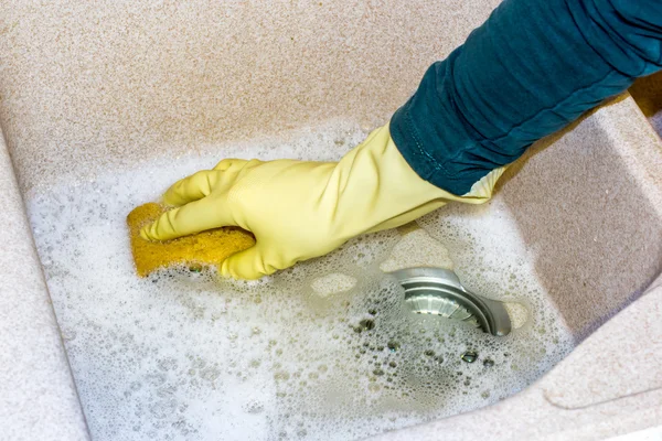 clean a granite sink with a sponge