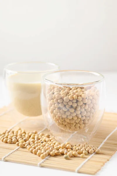 Soybeans seed and soy milk in a glass, Healthy drink