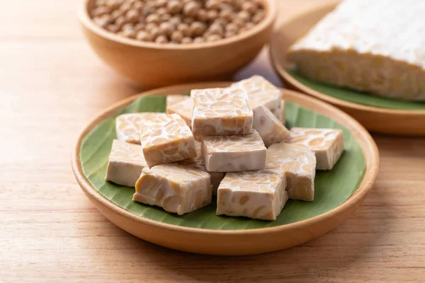 Tempeh made from fermented soybeans, Traditional Indonesian food, Healthy vegan and plant based ingredients