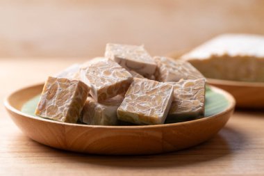Tempeh made from fermented soybeans, Traditional Indonesian food, Healthy vegan and plant based ingredients