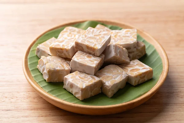 Tempeh made from fermented soybeans, Traditional Indonesian food, Healthy vegan and plant based ingredients