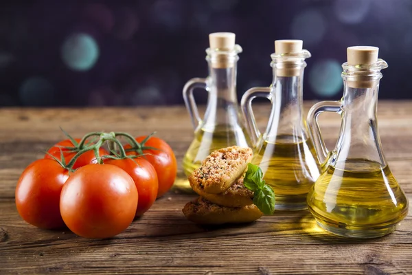 Fresh olive oil ,baguettes, tomatoes — Stock Photo, Image