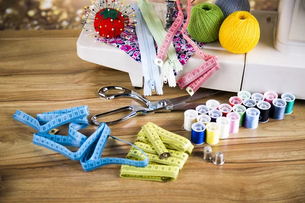 Sewing accessories on wooden table — Stock Photo, Image