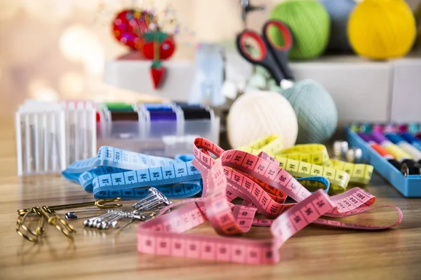 Sewing accessories on wooden table — Stock Photo, Image