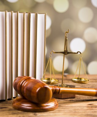 Golden scales of justice, books, Statue of Lady Justice. Owl and paragraph